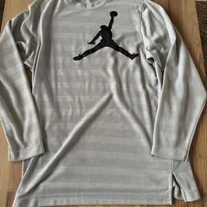 Air Jordan long sleeve shirt.  Color is gray and is size large.
